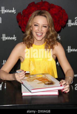 Kylie Minogue signs copies of her book Kylie/Fashion at Harrods London England - 28.11.12 Featuring: Kylie Minogue signs copies of her book Kylie/Fashion at Harrods Where: London United Kingdom When: 28 Nov 2012 Stock Photo