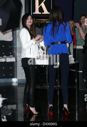 Kendall Jenner and Kylie Jenner appear at Kardashian Khaos inside The Mirage Hotel & Casino Las Vegas Nevada - 15.12.12 Featuring: Kendall Jenner and Kylie Jenner Where: United States When: 15 Dec 2012 Stock Photo