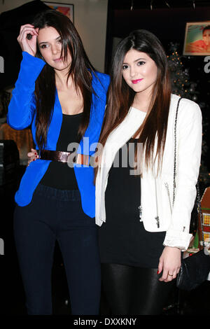 Kendall Jenner and Kylie Jenner appear at Kardashian Khaos inside The Mirage Hotel & Casino Las Vegas Nevada - 15.12.12 Featuring: Kendall Jenner and Kylie Jenner When: 15 Dec 2012 Stock Photo