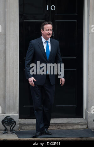 London, UK. 1st April 2014. British Prime Minister David Cameron exits 10 Downing Street before welcoming Italian Prime Minister Matteo Renzi (not pictured), on Tuesday April 1, 2014. Credit:  Heloise/Alamy Live News Stock Photo