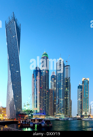 Twilight skyline view of modern skyscrapers in MArina district in Dubai United Arab Emirates Stock Photo