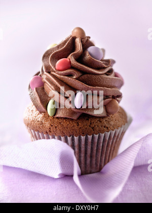 Chocolate and Smarties cupcakes Stock Photo