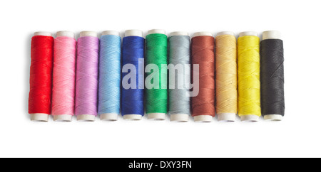 Colorful thread spools isolated on white background Stock Photo