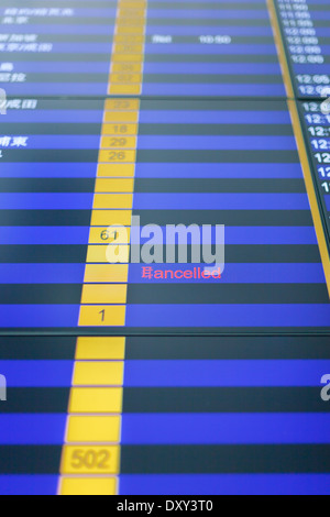 Flight cancelled. Airport arrival and departure board sign showing on ...