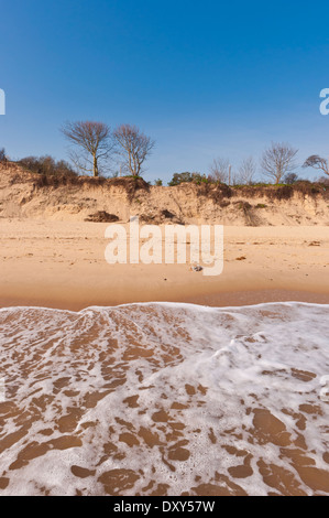 Norfolk beach sandy sunny sand  sea waves Hemsby England UK Stock Photo