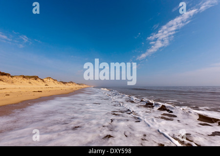 Norfolk beach sandy sunny sand sea waves Hemsby England UK Stock Photo