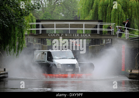 BBC Top Gear presenters Jeremy Clarkson, Richard Hammond and James May pilot a hovercraft made from a van on the river Avon. Stock Photo