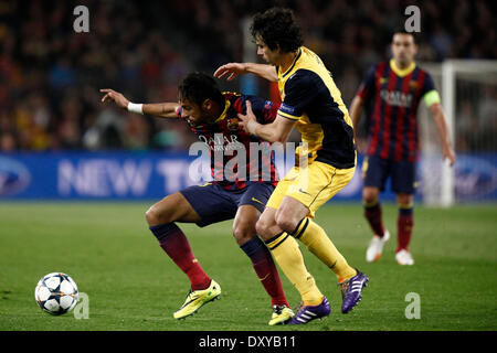 Barcelona, Spain. 1st Apr, 2014. Barcelona's Neymar (L) vies for the ball during the UEFA Champions League quarter-final first leg match against Atletico Madrid at Camp Nou stadium in Barcelona, Spain, April 1, 2014. The match ended in a 1-1 draw. Credit:  Pau Barrena/Xinhua/Alamy Live News Stock Photo