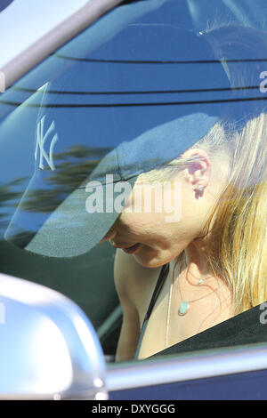 Rosie Huntington-Whiteley leaving a private gym in West Hollywood with her head down hidden under a New York baseball cap. She then drove off in an Audi Convertible Featuring: Rosie Huntington-Whiteley Where: Los Angeles California USA When: 13 Nov 2012 Stock Photo