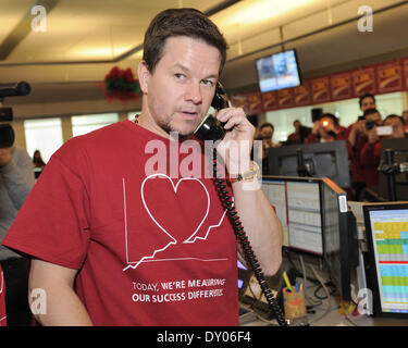 Mark Wahlberg joins CIBC traders making calls at CIBC Miracle Day to help raise money for children's charities Featuring: Mark Wahlberg Where: Toronto Ontario Canada When: 05 Dec 2012 Stock Photo