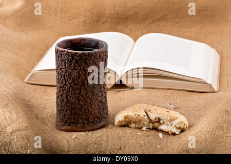 still life with chalice and bread on the textile tablecloth Stock Photo
