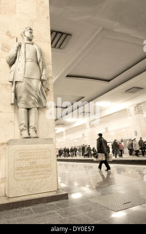 A statue of Zoya Kosmodemyanskaya brave woman partisan fighter during WWII at Partisanskaya metro station. Stock Photo