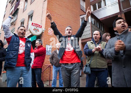 Madrid, Spain. April 2, 2014.  PAH members celebrate the temporary cancellation of the eviction. Platform of People Affected by Mortgages (PAH) protest at the home of Ximena, a migrant from South America to be evicted that morning. More than 400,000 evictions have been executed since the start of the financial crisis in Spain in 2008. Credit:  Oscar Arribas Burgos/Alamy Live News Stock Photo