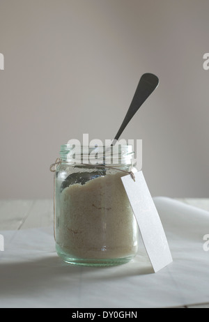 Still life food image of a jar of ground almonds Stock Photo