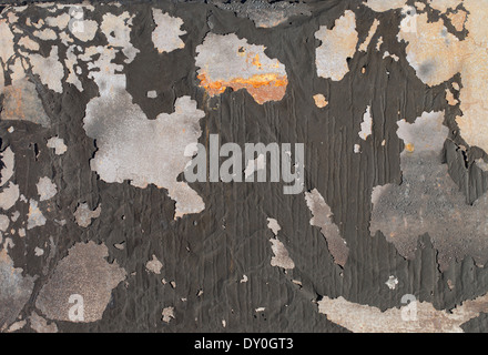 Background image of old flaking paint on metallic surface. Stock Photo