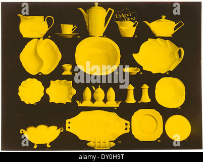 This photograph, taken by Sam Hood in the 1930s, shows Victoria China dinnerware. The image focuses on the design and quality of the dinnerware, representing mid-20th-century dining trends. Stock Photo