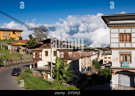Eastern Bhutan, Mongar, early morning cloud over town centre Stock Photo