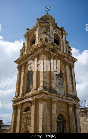 The 18th century bell tower of the Greek Orthodox Monastery of the Holy Cross. The monastery, consecrated in the 4th century under Constantine the Great, built in the 11th century, traditionally erected on the burial spot of Adam's head, enshrines an ancient tradition that pine, fir and cypress branches planted by Lot, grew miraculously into one tree (Isaiah 60:13). It is this tree from which the cross of Jesus was made. Stock Photo