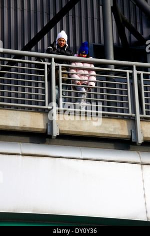 Couple standing on balcony at Murrayfield stadium Stock Photo