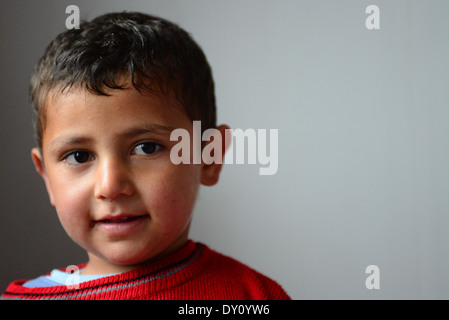 Series of portraits of children refugees. Thousands of children escaped with theirs parents from Syria because of civil war. Stock Photo