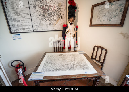 Battle Of Waterloo Historic Maps Ferme du Caillou Waterloo Belgium // WATERLOO, Belgium — Historic maps of the Battle of Waterloo displayed at Ferme du Caillou, Napoleon's last headquarters before the battle. These strategic maps, exhibited in the museum where Napoleon spent the night of June 17-18, 1815, illustrate the battle plans and troop positions. The collection includes original battle plans studied by Napoleon and his staff during their final strategic preparations. Stock Photo