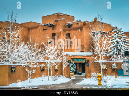 The Inn and Spa at Loretto on a snowy winter day, an architectural star in the Pueblo style of the Southwest, nearby the plaza in Santa Fe, NM, Stock Photo