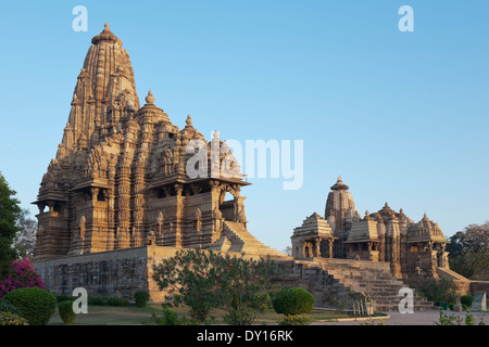 Khajuraho Temples, India. Temples Kandariya-Mahedev (nearest), the small Mahadeva (centre) and Devi Jagadamba, western group Stock Photo