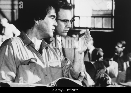 Oliver Stone and Kevin Costner, on-set of the Film, "JFK", 1991 Stock Photo
