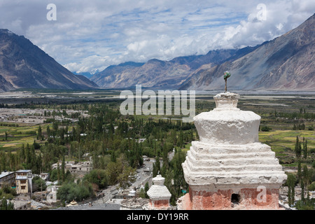 Diskit village, Ladakh, India, View of Nubra valley with chortens in the foreground Stock Photo