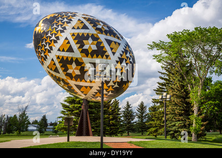 The large egg is a giant sculpture of a pysanka, a Ukrainian-style Easter egg in Vegreville, Alberta, Canada. Stock Photo