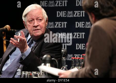 Hamburg, Germany. 02nd Apr, 2014. Former German Chancellor and co-publisher of newspaper 'Die Zeit' Helmut Schmidt (L, SPD) and editor-in-chief of 'Die Zeit' Giovanni di Lorenzo sit on the podium during the series of events 'The long night of Die Zeit' at Schauspielhaus in Hamburg, Germany, 02 April 2014. The former German Chancellor answered collected readers' questions on Hamburg. 'Die Zeit' will for the first time be published with a local section for Hamburg on 03 April 2014. Photo: BODO MARKS/DPA/Alamy Live News