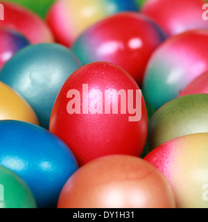 Collection of colorfully painted Easter eggs forming a background Stock Photo