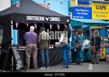 Food stall at Chapel Street Market, London Stock Photo