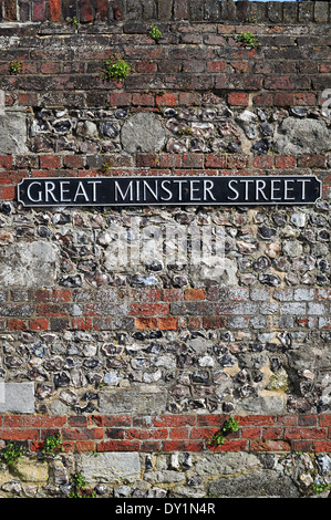 Old wall in Great Minster Street, Winchester, Hampshire, England - adjacent to Winchester Cathedral Stock Photo