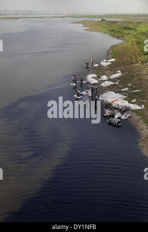 Dhaka, Bangladesh. 22nd Mar, 2014. Indiscriminate discharge of liquid waste by the tannaery industries of Dhaka's Hazaribagh area has ruined a large part of the Buriganga river, causing immense suffering to residents living on the banks. © Probal Rashid/NurPhoto/ZUMAPRESS.com/Alamy Live News Stock Photo