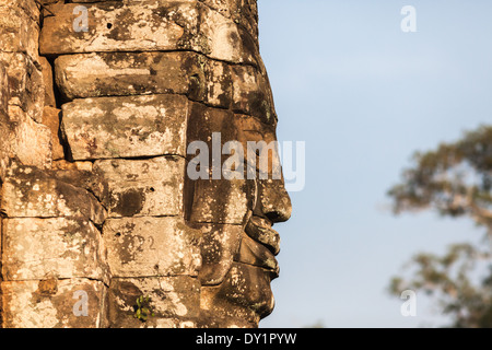 Sculpture of smiling face in Bayon Temple in Angkor near Siem Reap, Cambodia Stock Photo