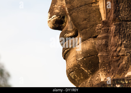 Smiling stone face in Bayon Temple in Angkor near Siem Reap, Cambodia Stock Photo