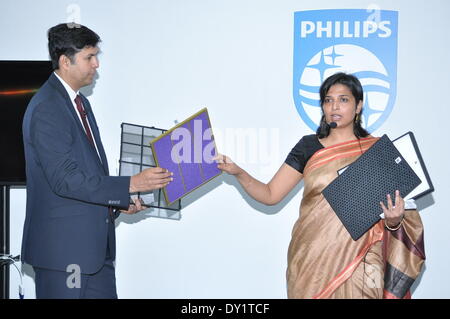 Bangalore, India. 3rd Apr, 2014. Staff members show the innovation of Multi-layer Air Purifier in Bangalore, India, April 3, 2014. Electronics company Royal Dutch Philips on Thursday released a range of innovations which specially developed for South Asia at the Philips Innovation Center in Bangalore of India. © Chen Xuelian/Xinhua/Alamy Live News Stock Photo