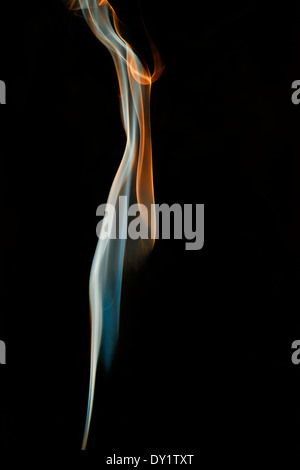 abstract colored smoke isolated on a black background Stock Photo
