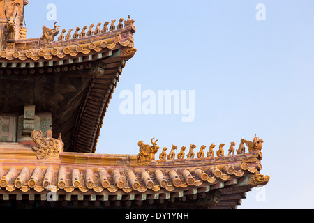 ASIA Beijing CHINA Detail Forbidden City Imperial roof decoration of highest status on the roof ridge of the Hall of Supreme Har Stock Photo