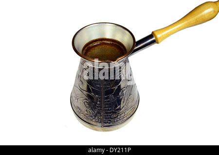 turkish coffee brewing pot isolated on white background Stock Photo