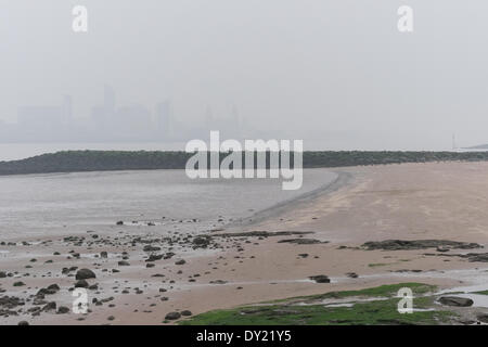 Liverpool, UK. 3rd April 2014. An unclear view down the Mersey from New Brighton on Thursday April 3rd, 2014. Smog created by a mix of pollution and Saharan dust passed over the region. Credit:  Peter Carr/Alamy Live News Stock Photo