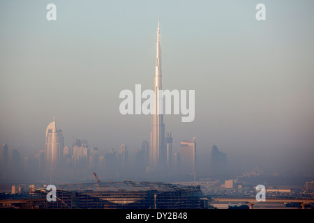 The newly opened Burj Khalifa, the tallest building at 828 metres (2716 feet), rises above the Dubai skyline, in the U.A.E. Stock Photo