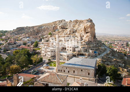 mosque and rock houses, urgup, cappadocia, anatolia, turkey, asia Stock Photo