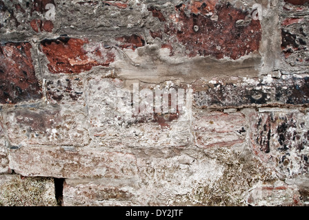 Texture of old weathered stone wall. Stock Photo