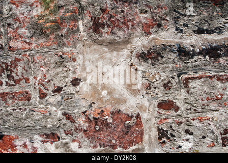 Texture of old weathered stone wall. Stock Photo