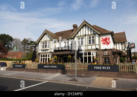 Pub exterior advertising 'live sport', 'Fresh Coffee' and 'free Wi-Fi' to attract customers. Stock Photo
