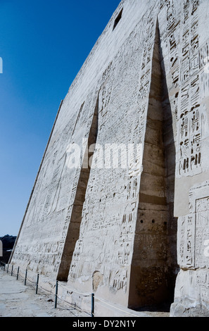 Temple of Ramses III at Medinet Habu: reliefs on the first pylon Stock Photo