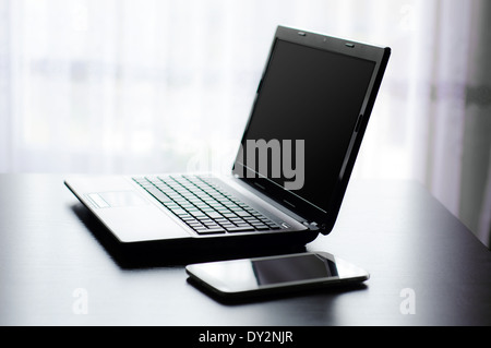 Modern laptop and tablet in office Stock Photo