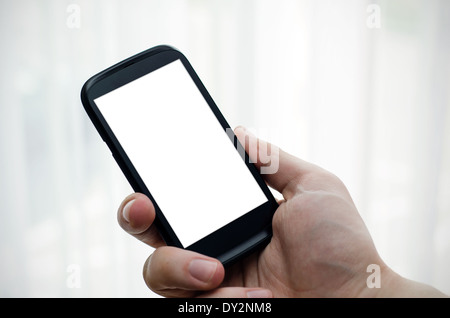 Hand holding mobile phone with blank display Stock Photo
